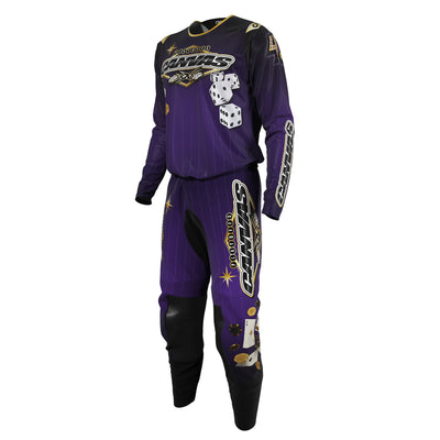 Purple and black motocross outfit with rolling dice and a Las Vegas styled logo for Canvas MX.