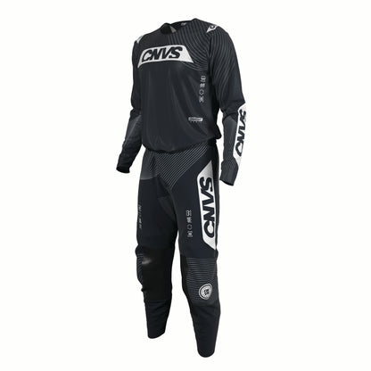 Black motocross suit with white branding on a white background